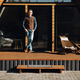Full length portrait of senior man on terrace of wooden cabin - PhotoDune Item for Sale
