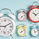 Collection of alarm clocks. Start of the day, waking up, morning, different time zones. - PhotoDune Item for Sale
