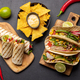 Mexican food featuring tacos, burritos, nachos, burgers - PhotoDune Item for Sale