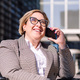 businesswoman using wheelchair talking by phone - PhotoDune Item for Sale