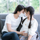 Asian mother and daughter wearing medical mask and cuddling daughter, touching foreheads together - PhotoDune Item for Sale
