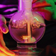 Woman smoking indica marijuana, water bong in neon light at home. Cannabis. - PhotoDune Item for Sale