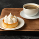 Meringue tart with coffee cup on dark gray background - PhotoDune Item for Sale