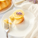 Piece of lemon cake on white table with lavender - PhotoDune Item for Sale