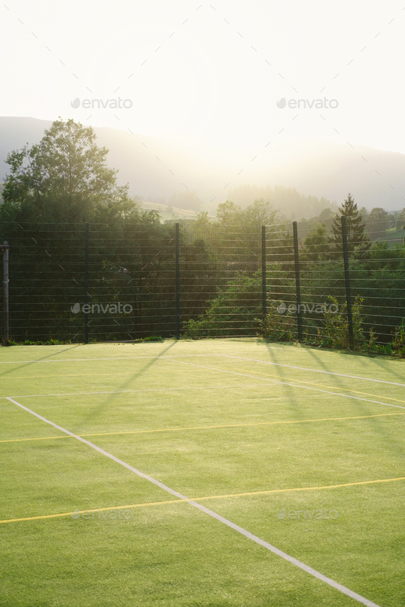 Green sport fields, tennis court with lines Background