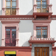 Street view of the facade of an old colonial building, Quito, Ecuador. - PhotoDune Item for Sale
