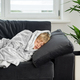 Seasonal cold. Sick preteen boy resting on couch wrapped in blanket. - PhotoDune Item for Sale