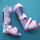 Child cerebral palsy disability, legs orthosis. - PhotoDune Item for Sale