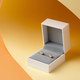 White jewelry box on yellow studio background - PhotoDune Item for Sale
