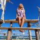 Gorgeous Blonde Woman Relaxing on the Beach - PhotoDune Item for Sale