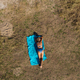 Aerial View of Blonde Woman in Bikini Sunbathing - PhotoDune Item for Sale
