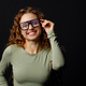 Happy smiling summer young woman wearing glasses looking at camera with joyful smile - PhotoDune Item for Sale