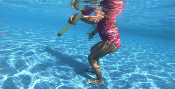 Underwater Walking Young Child