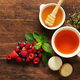 natural tea in a cup with fresh berries and mint - PhotoDune Item for Sale