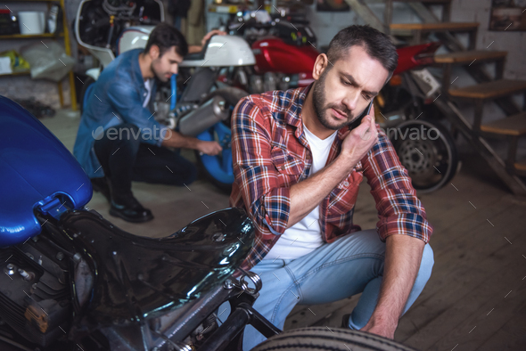 Guys at the motorbike repair shop