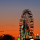 A ferris wheel against a night sky at sunset - PhotoDune Item for Sale