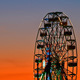 A ferris wheel against a night sky at sunset - PhotoDune Item for Sale