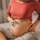 Unrecognizable Pregnant Woman Applying Moisturizing Cream On Her Belly - PhotoDune Item for Sale
