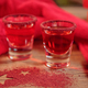 Cranberry vodka shot and Christmas decorations - PhotoDune Item for Sale