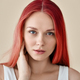 Young adult woman beauty female red hair model at beige background. Portrait. - PhotoDune Item for Sale
