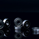 Stainless steel ball bearing on blackk background. Set of thrust ball bearing and silver ball bear - PhotoDune Item for Sale