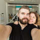 Portrait of happy young couple making selfie indoors - PhotoDune Item for Sale
