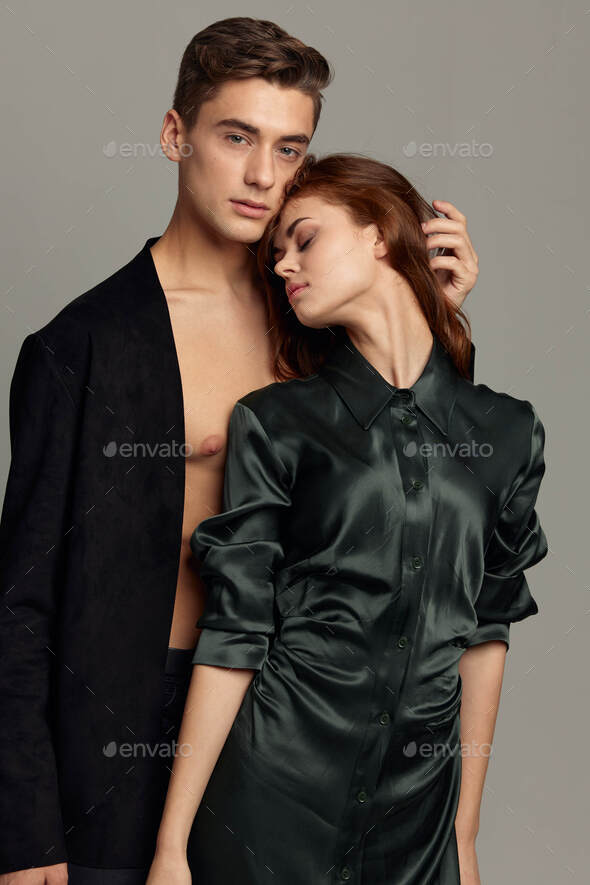 man and woman stand side by side luxury romance moda Studio