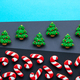 Christmas background with festive gingerbread covered with icing, flat lay. - PhotoDune Item for Sale