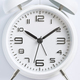 Close-up of a white alarm clock on a white background, ten o&#39;clock. - PhotoDune Item for Sale