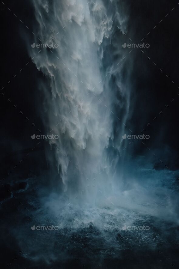 Beautiful view of a mysterious waterfall in the dark