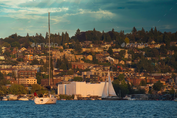 SOUTH LAKE UNION IN SEATTLE WITH SAIL BOATS AND A VIEW OF THE WESTERN SHORELINE OF CAPITOL HILL