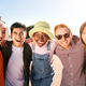 Portrait of multiracial group of students having fun hugging laugh a lot. They laugh outdoors - PhotoDune Item for Sale