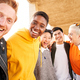 Portrait of multiracial group of friends hugging and looking camera. Smiling people having fun - PhotoDune Item for Sale