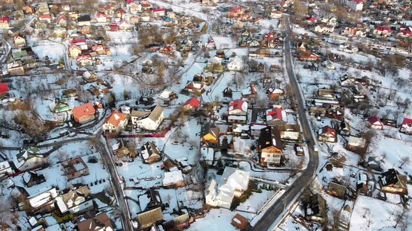 Aerial View of a Village in the Carpathian Mountains in Winter. Yaremche, Ukraine. alt