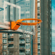 Outdoor basketball backboard and hoop rim with chain net in urban residential district - PhotoDune Item for Sale
