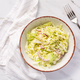 Vegan coleslaw salad made of freshly shredded white cabbage with red onions - PhotoDune Item for Sale