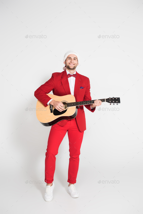Happy girl posing with guitar, isolated in white Stock Photo - Alamy