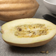 Whole and halved fresh Baked potato Acorn Squash on a cutting board - PhotoDune Item for Sale