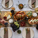 Top view festive dinner table with delicious rustic turkey dishes - PhotoDune Item for Sale