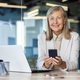 Portrait of mature gray-haired businesswoman inside office at workplace, woman boss smiling and - PhotoDune Item for Sale