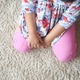  child sitting W posture on the floor . - PhotoDune Item for Sale