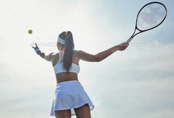 Woman, tennis and serving with fitness on court and start game, sports and athlete, performance and