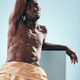 Muscle, art and black man with fitness, thinking and creativity on a blue studio background. Africa - PhotoDune Item for Sale