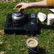 traveler man making coffee in the field - PhotoDune Item for Sale