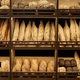 Various fresh breads on shelf in artisan bakery with rustic setup - PhotoDune Item for Sale