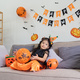 Cute little child girl with balloon. Happy family preparing for Halloween - PhotoDune Item for Sale