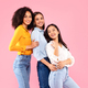 Diverse female friendship. Happy multiracial ladies embracing and posing, smiling at camera over - PhotoDune Item for Sale