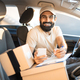 Indian Courier Taking Notes Using Application On Phone In Automobile - PhotoDune Item for Sale