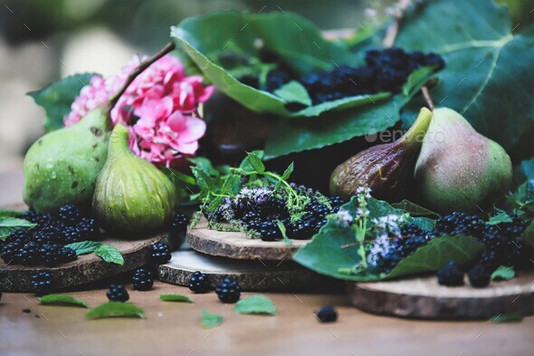 composition of freshly picked fruit (blackberries, figs and pears) - concept of fresh and natural fo