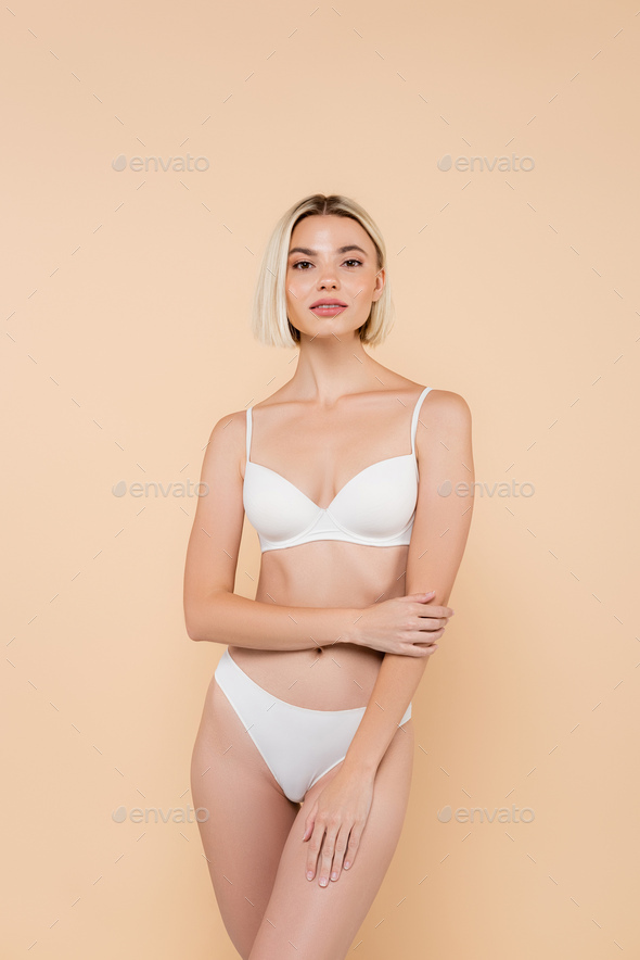 Women In White Underwear Posing Isolated On White Stock Photo